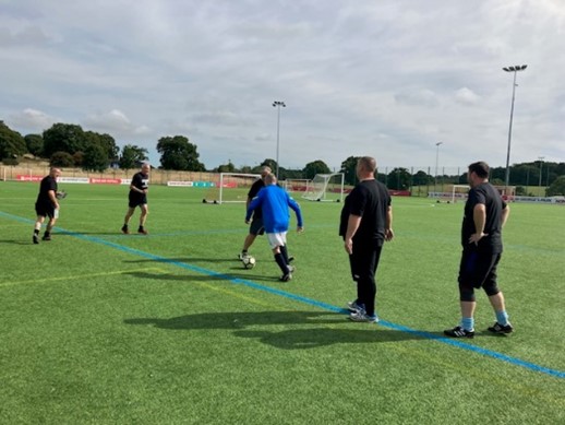 STAND TO football at St. George's Park